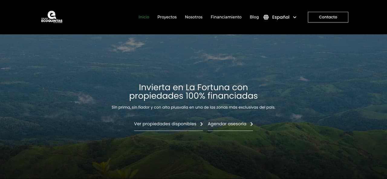 Grupo Ecoquintas homepage over an aerial view of the La Fortuna hills, with the language switcher and enquiry calls to action